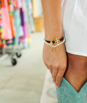 stretch beaded prayer bracelet layered with suede hope bracelet
