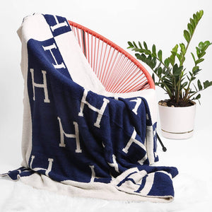 Monogram H Patterned Reversible Throw Blanket