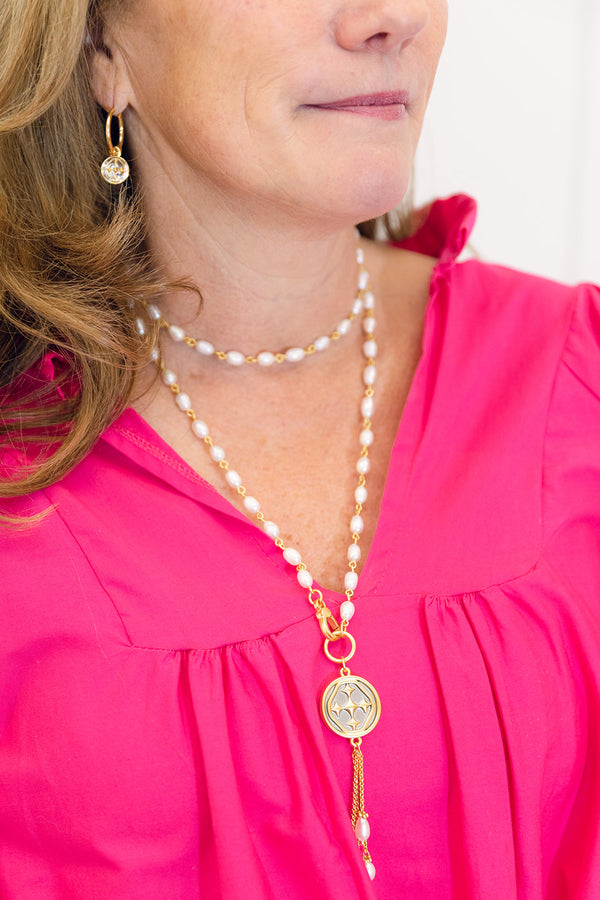 long pearl medallion necklace