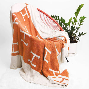 Monogram H Patterned Reversible Throw Blanket