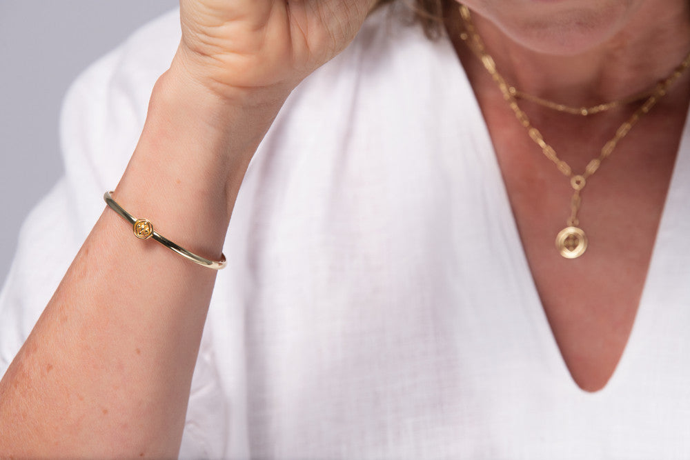 medallion bangle bracelet