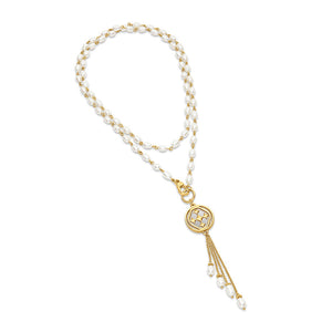 long pearl medallion necklace